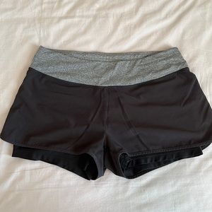 Black lined workout shorts